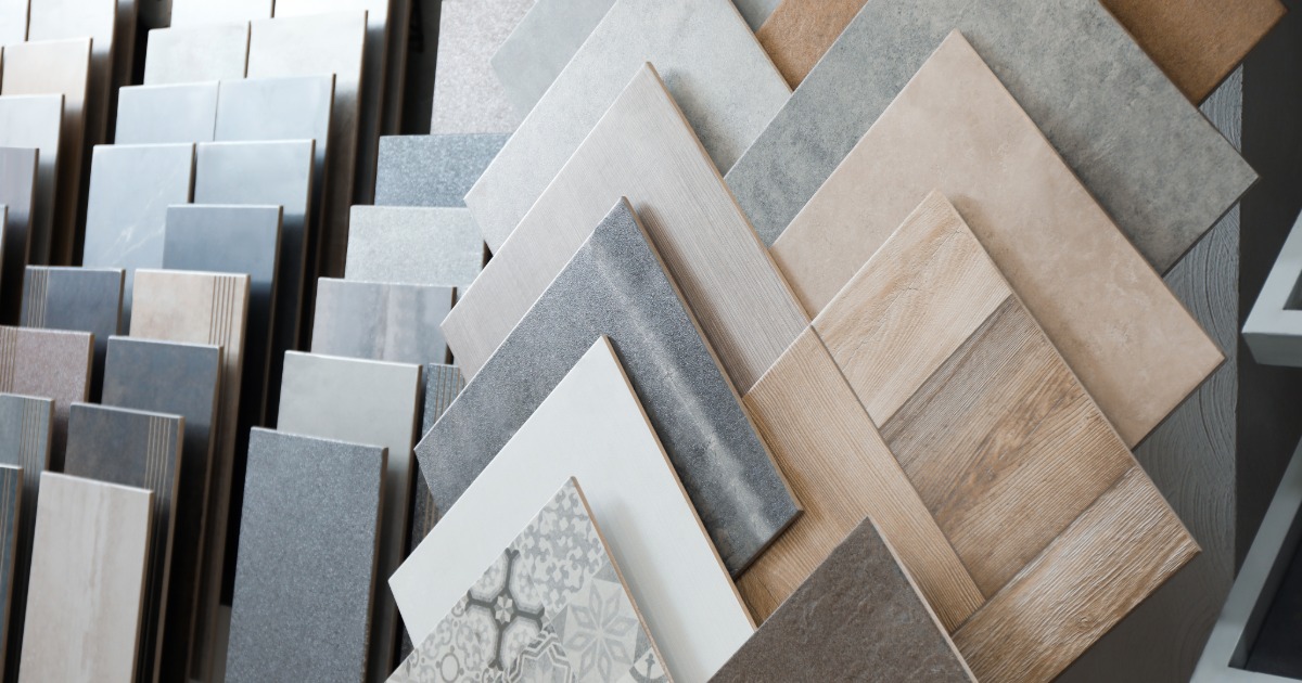 Bathroom renovation material selections including tile, hardware, plumbing fixtures, and countertop samples